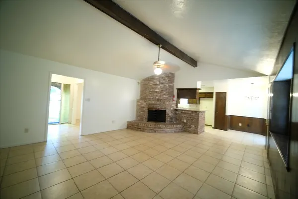a bathroom with a granite countertop sink a toilet and bathtub