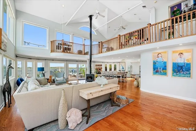 a living room with furniture fireplace and flat screen tv