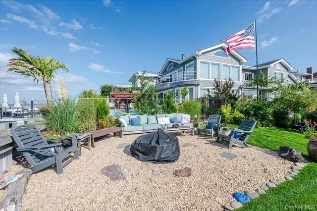a view of a swimming pool with lounge chair
