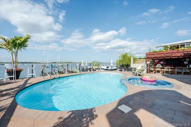 a view of a chairs and table in the patio