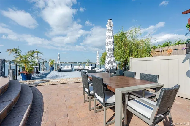 a view of a swimming pool with lounge chairs