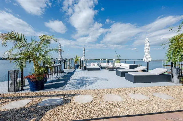 a view of a terrace with furniture