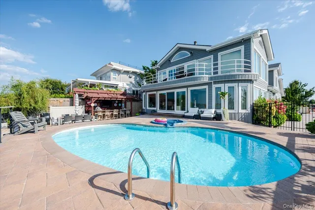 a view of a building with sitting area