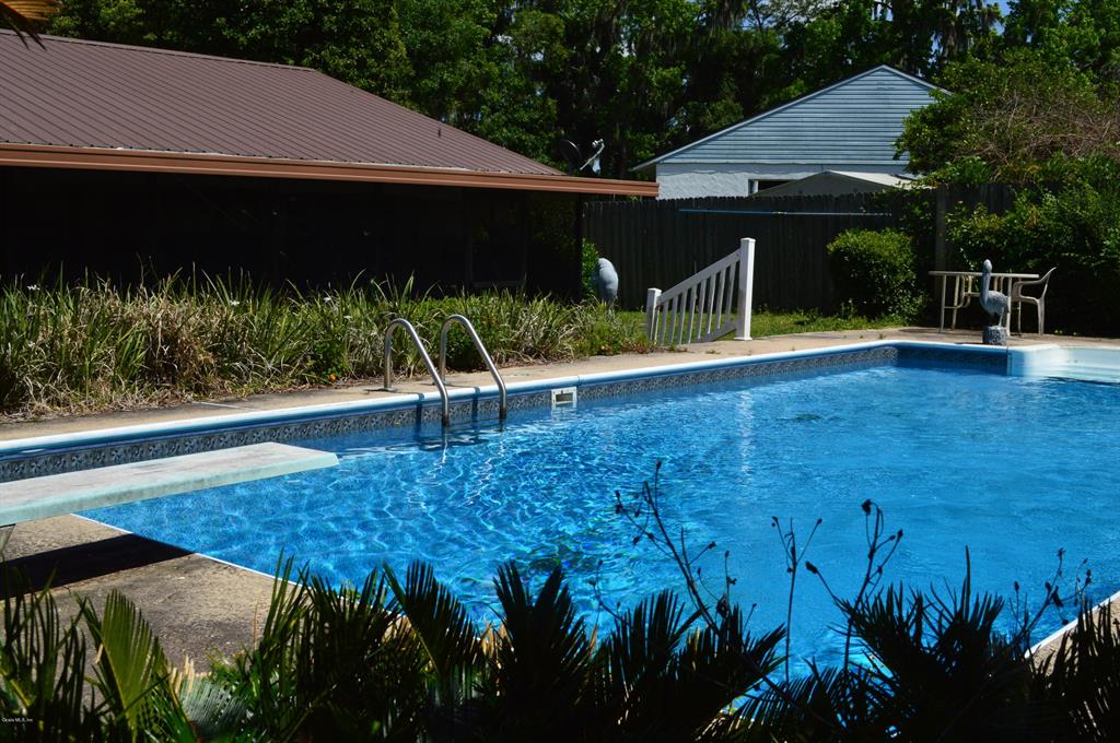 5446 Southeast Eli Road Belleview, FL 34420 - Photo 1 of 1 Refreshing Pool Home