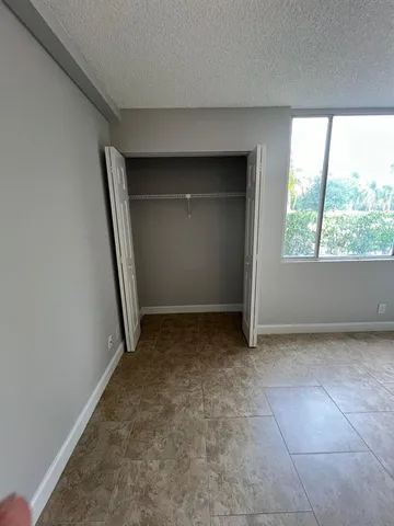 a view of a room with a large window