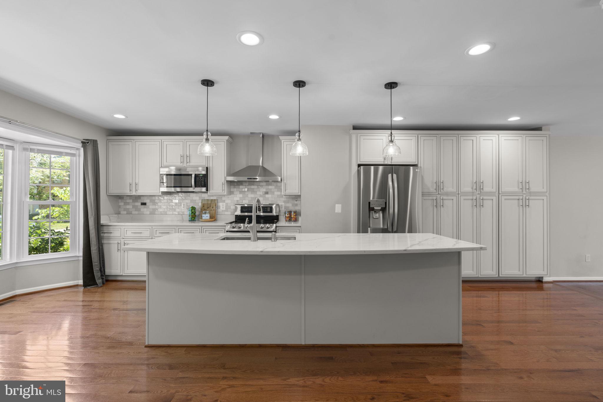 4722 Rams Horn Row Ellicott City, MD 21042 - Photo 5 of 50 Updated gourmet kitchen with large center island