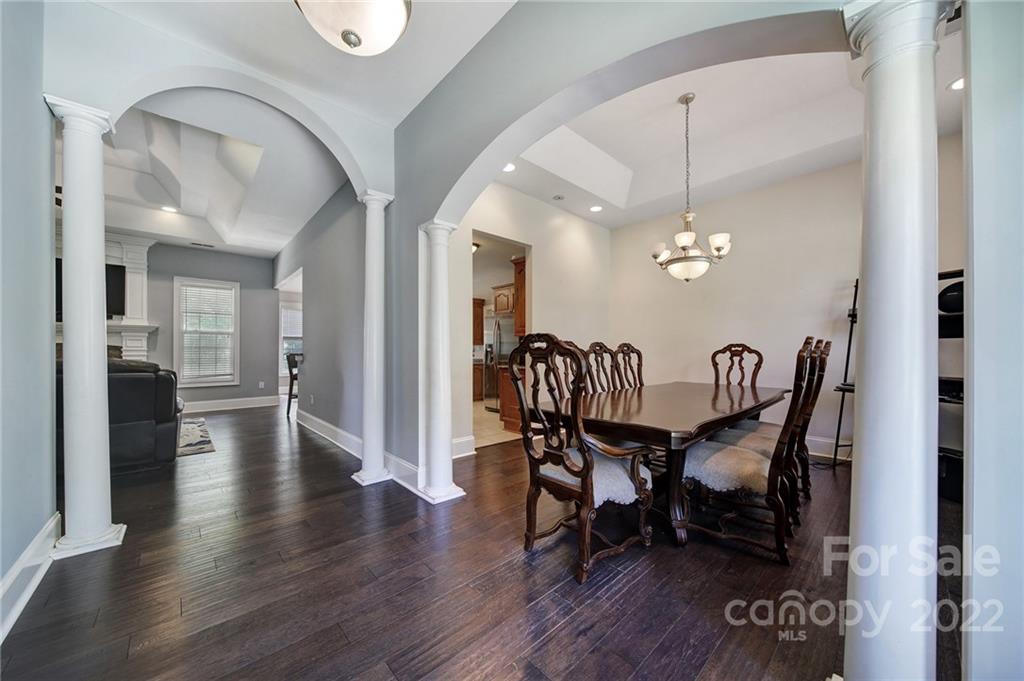 771 West Rambo Road, Unit B Rock Hill, SC 29730 - Photo 3 of 44 a view of a dining room with furniture and wooden floor