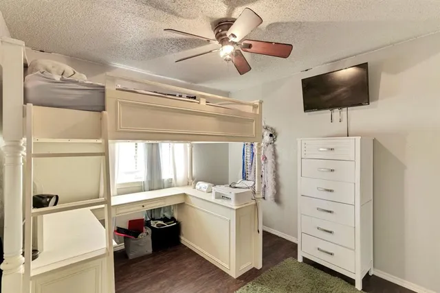 a room with furniture and a flat screen tv