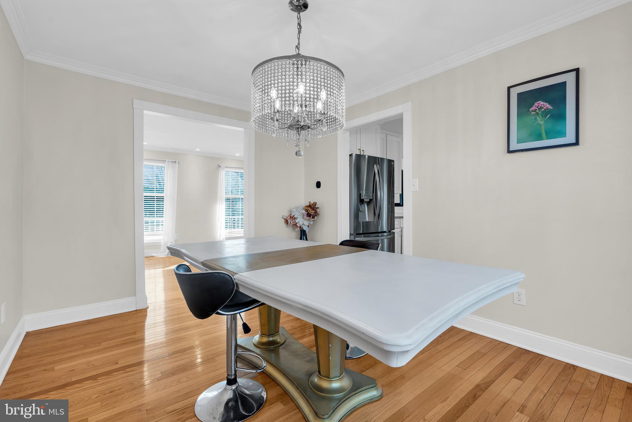 12 Fawn Hollow Road Burlington, NJ 08016 - Photo 13 of 47 a view of a dining room with furniture and wooden floor