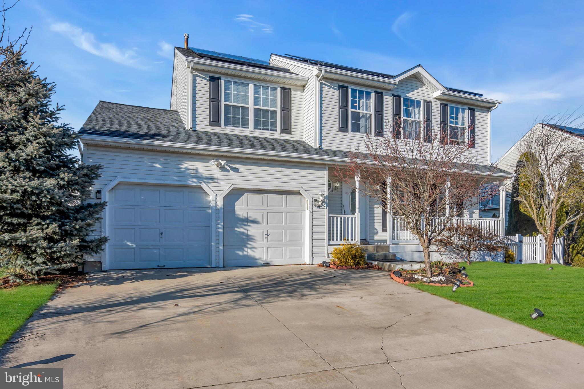 12 Fawn Hollow Road Burlington, NJ 08016 - Photo 2 of 47 a front view of a house with garden