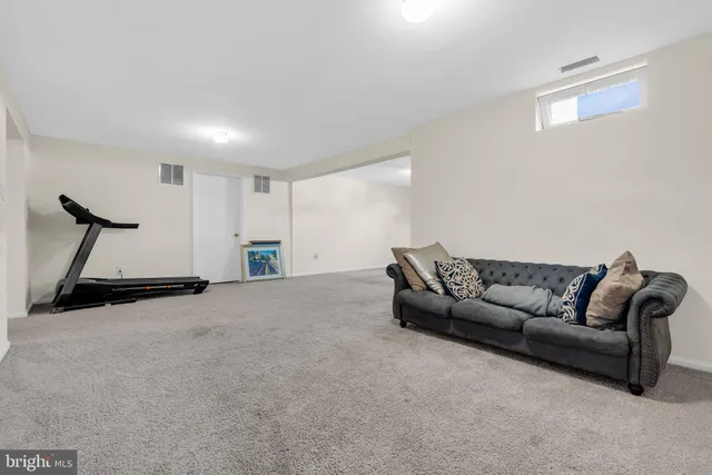 a living room with furniture and a couch