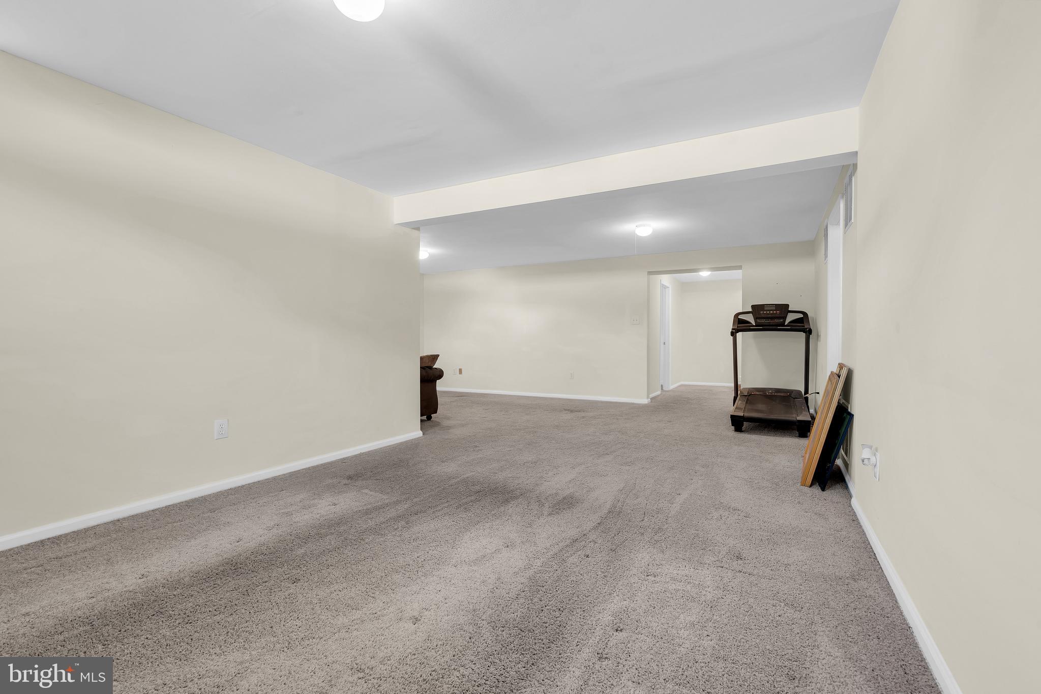 12 Fawn Hollow Road Burlington, NJ 08016 - Photo 40 of 47 a view of a big room with closet and rug