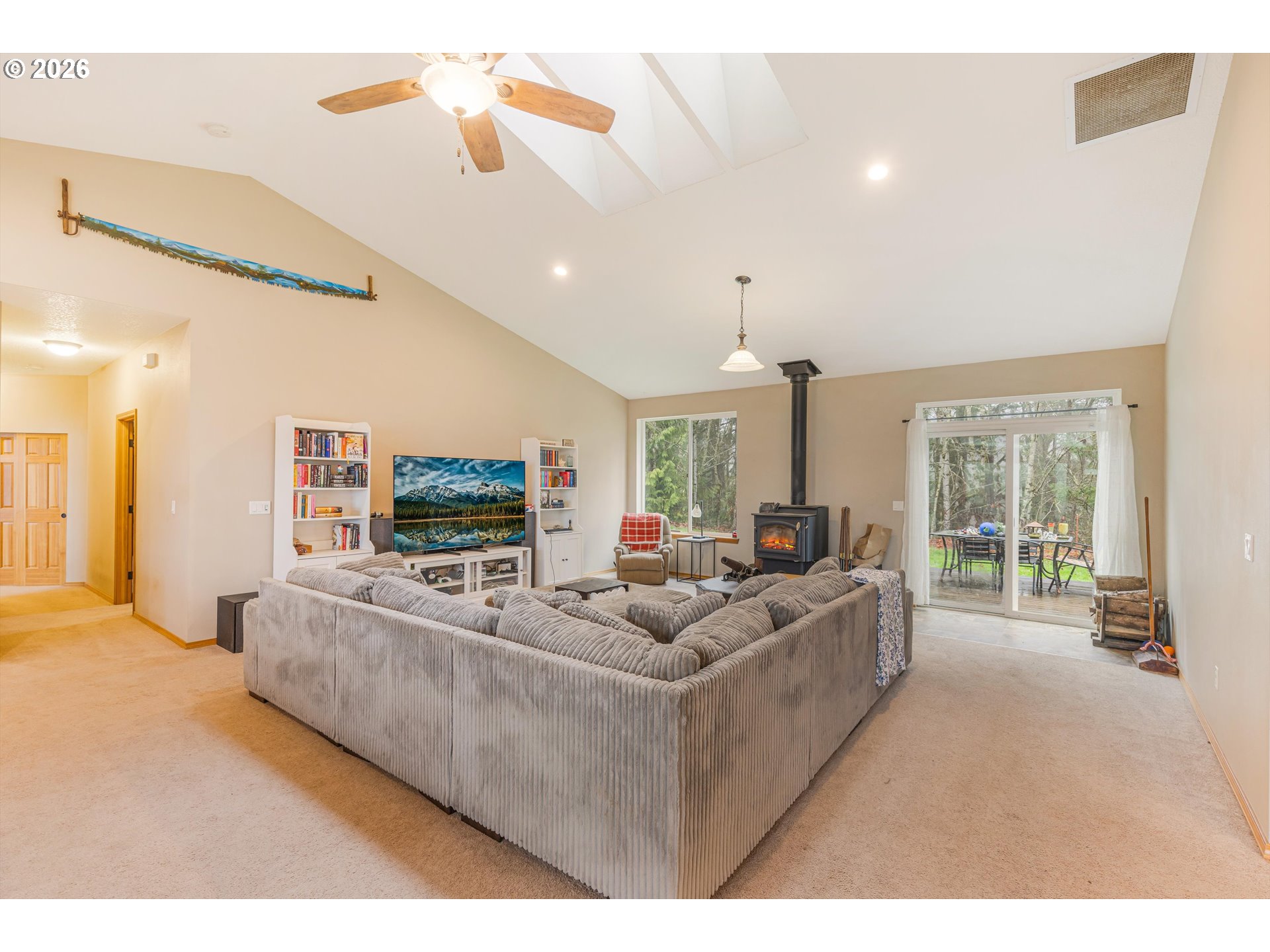 52365 Northwest Scofield Road Buxton, OR 97109 - Photo 15 of 48 a living room with furniture and a flat screen tv