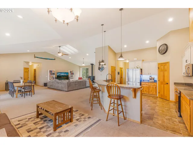 a living room with furniture and a table