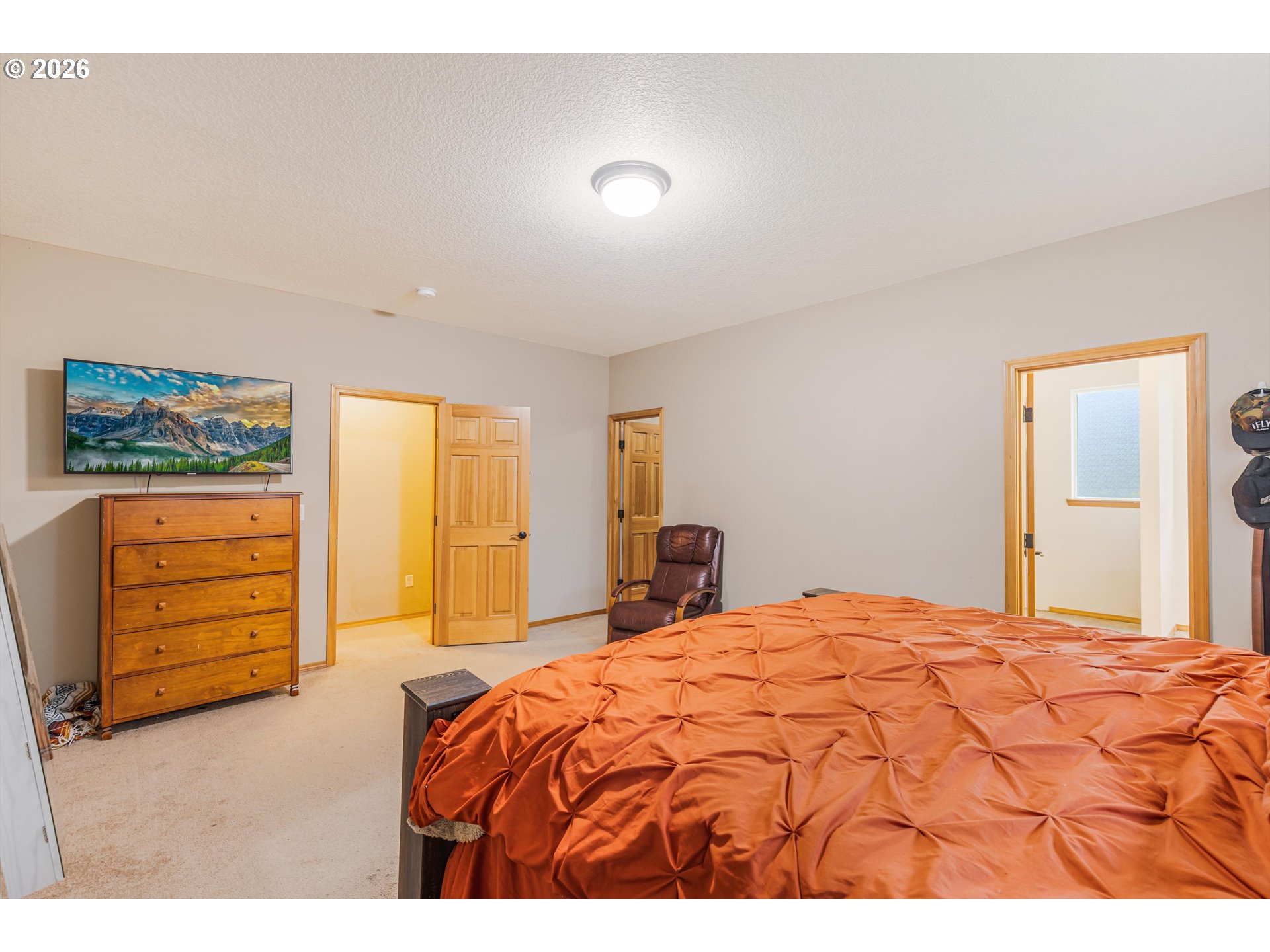 52365 Northwest Scofield Road Buxton, OR 97109 - Photo 27 of 48 a bedroom with a bed and a dresser