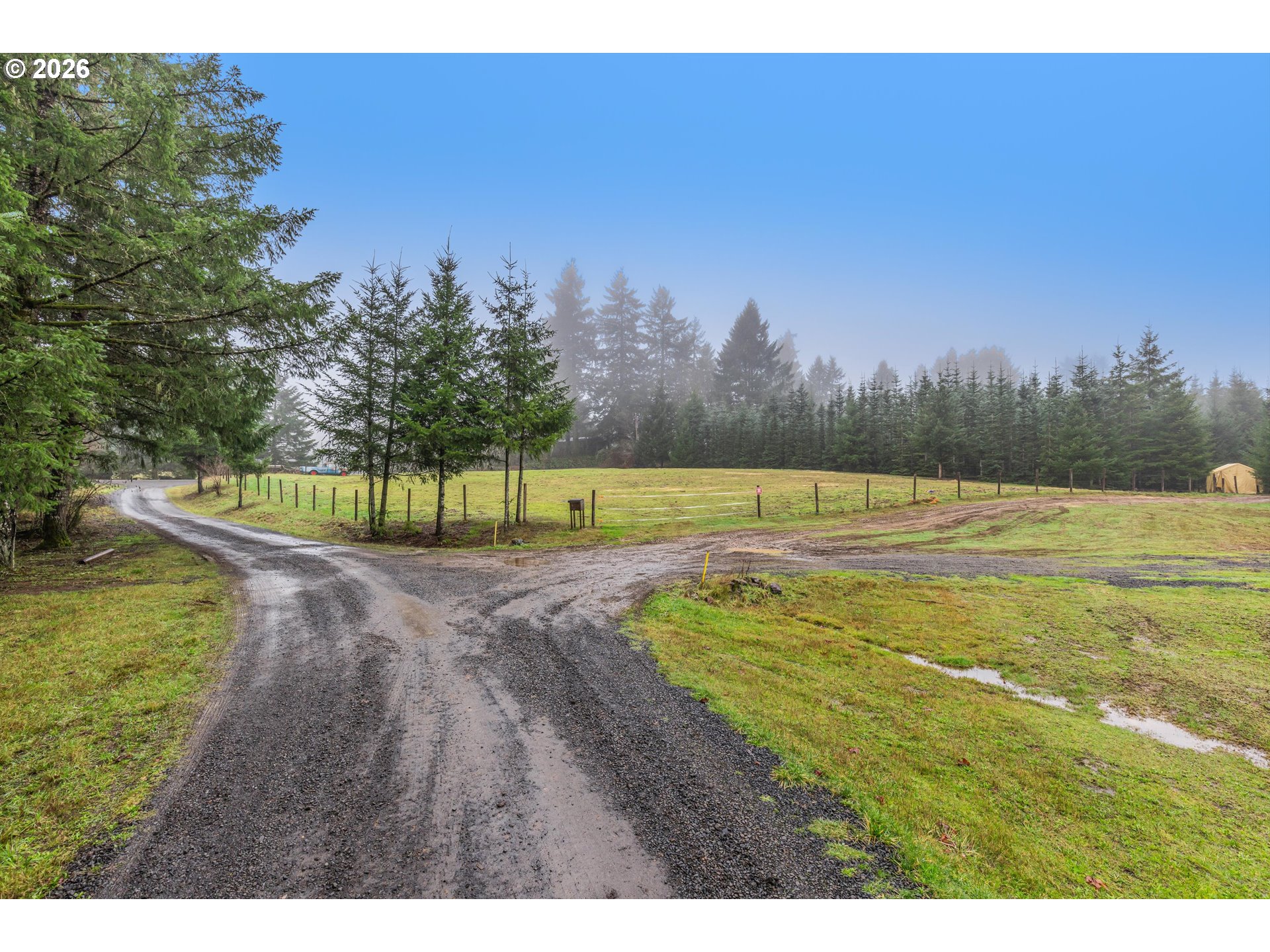 52365 Northwest Scofield Road Buxton, OR 97109 - Photo 41 of 48 a view of a golf course with a lake