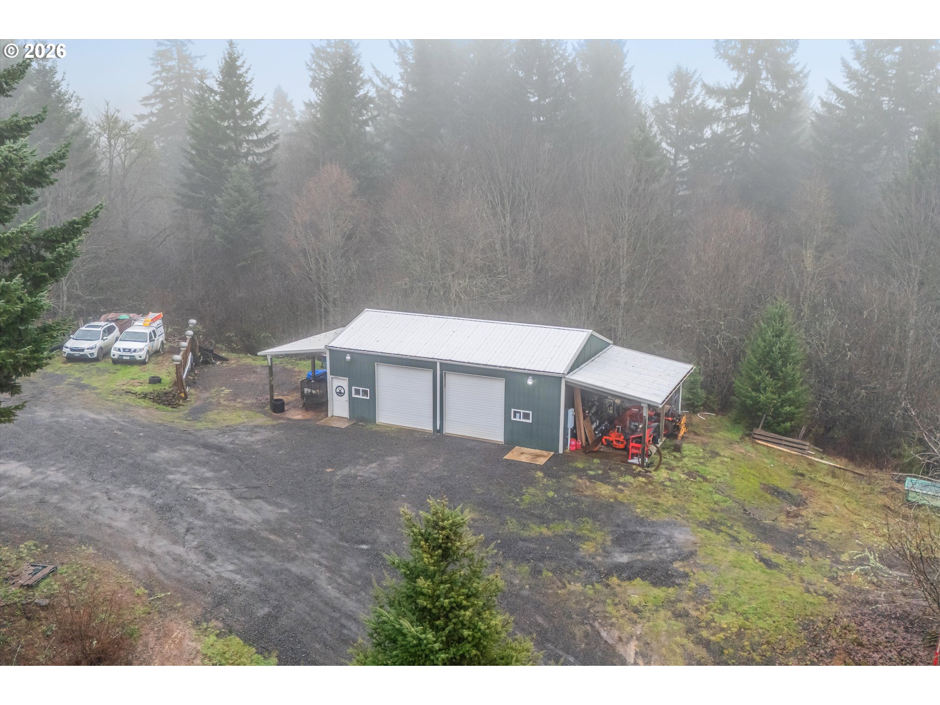 52365 Northwest Scofield Road Buxton, OR 97109 - Photo 45 of 48 a front view of a house with a yard