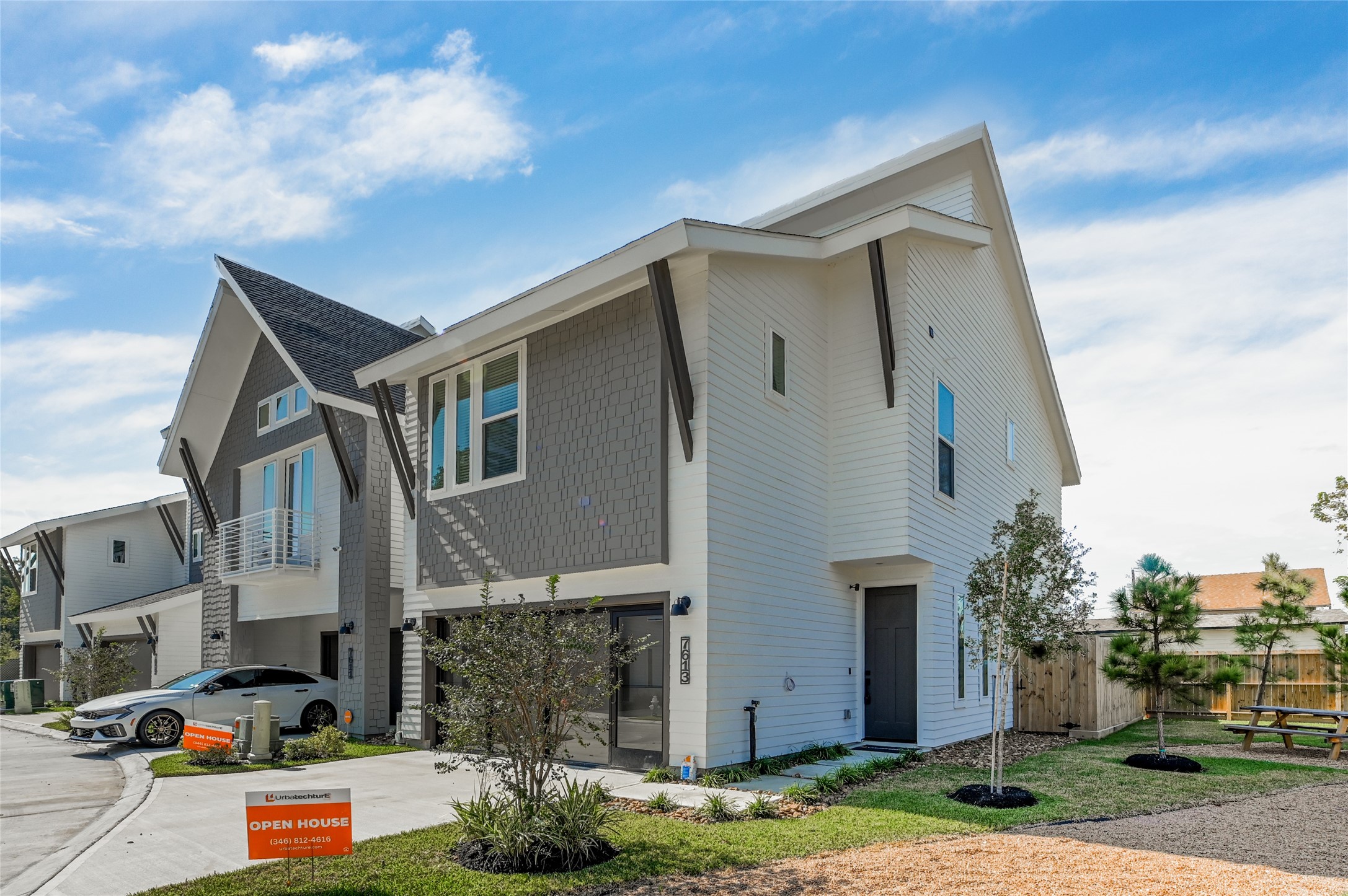 7607 Victory Reserve Street Houston, TX 77088 - Photo 1 of 50 a front view of residential houses with yard