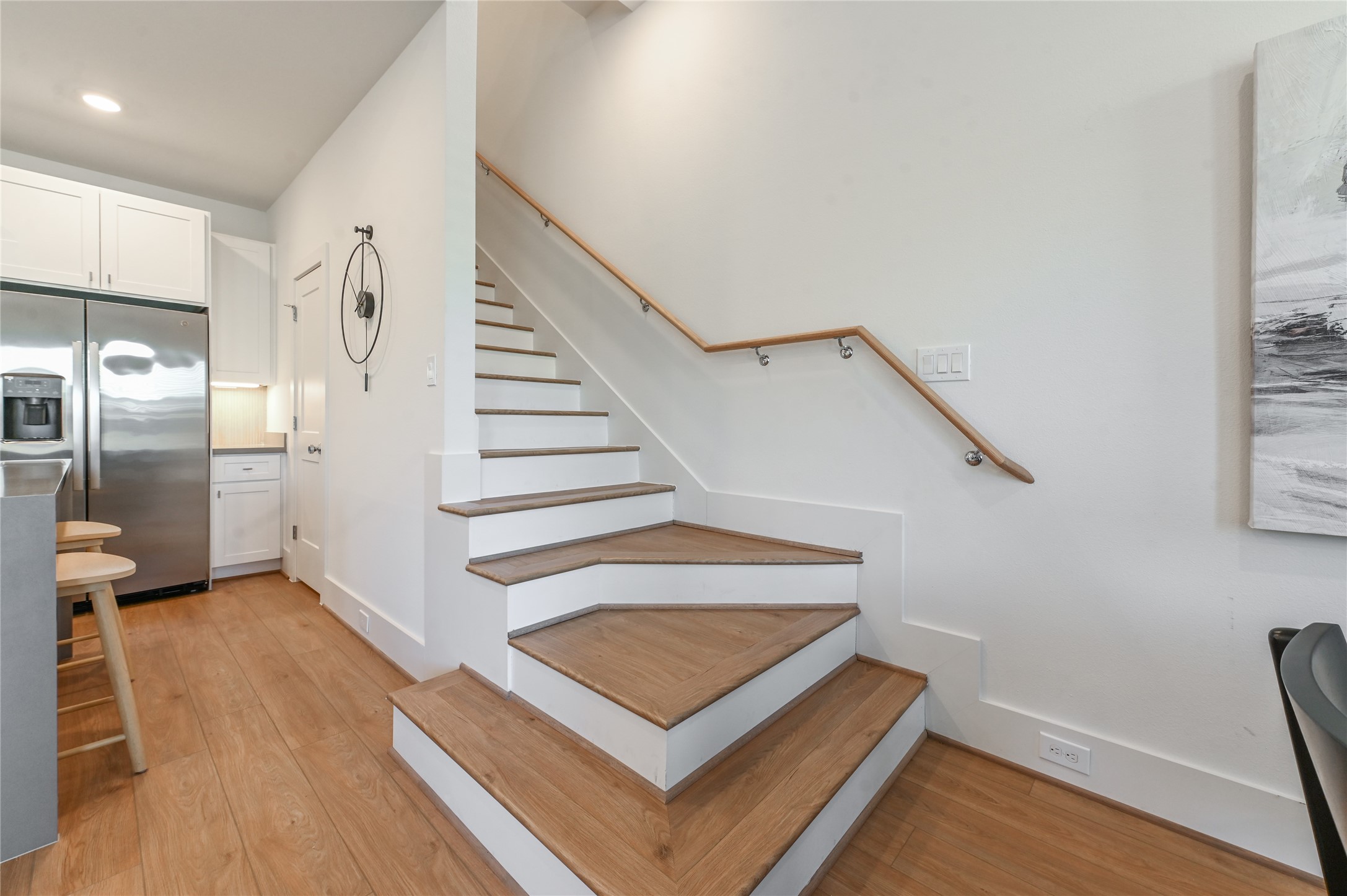 7607 Victory Reserve Street Houston, TX 77088 - Photo 19 of 50 a view of entryway and hall with wooden floor