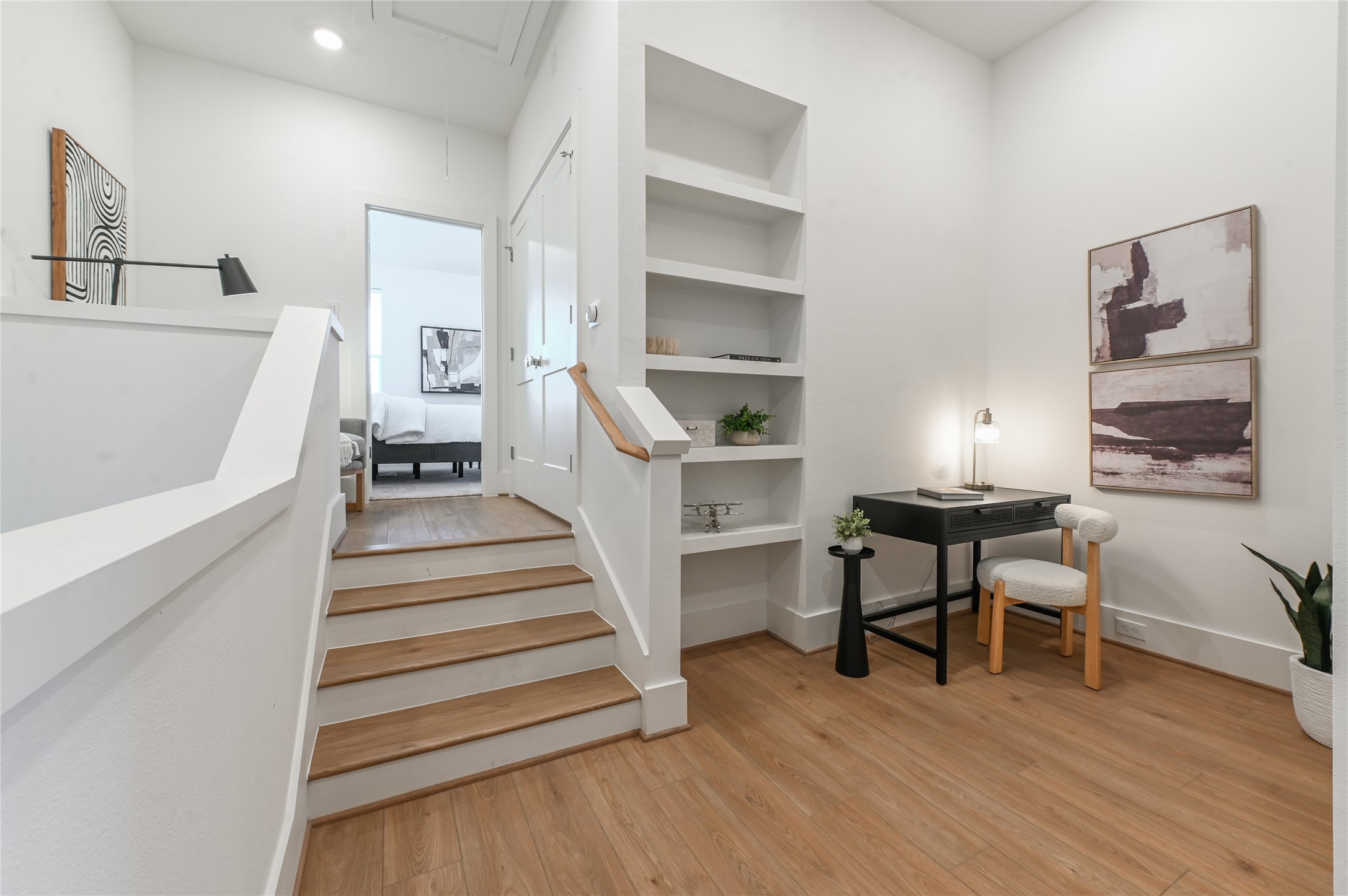 7607 Victory Reserve Street Houston, TX 77088 - Photo 20 of 50 a view of a room with wooden floor and furniture