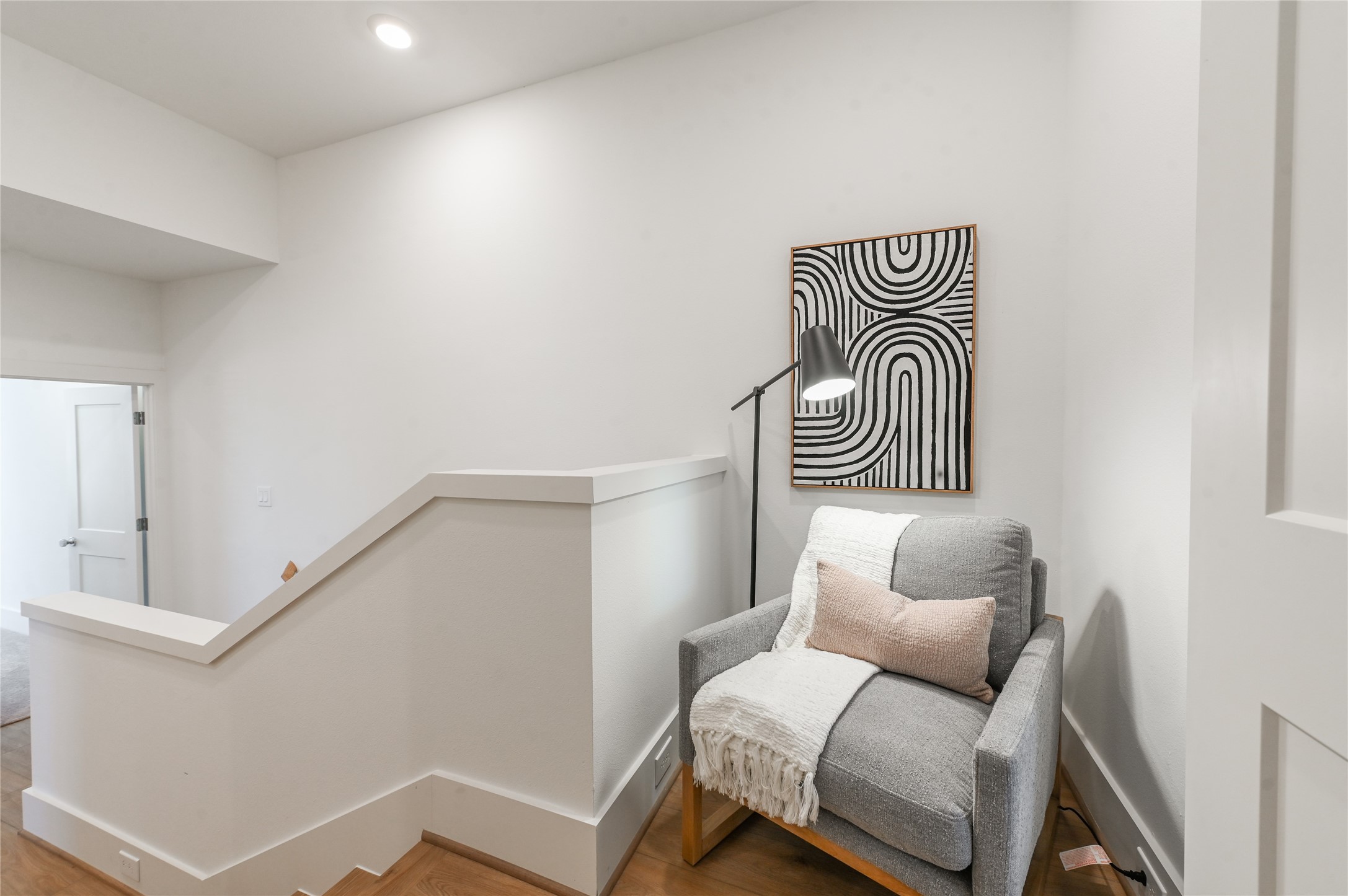 7607 Victory Reserve Street Houston, TX 77088 - Photo 23 of 50 a bedroom with a bed and a painting on the wall