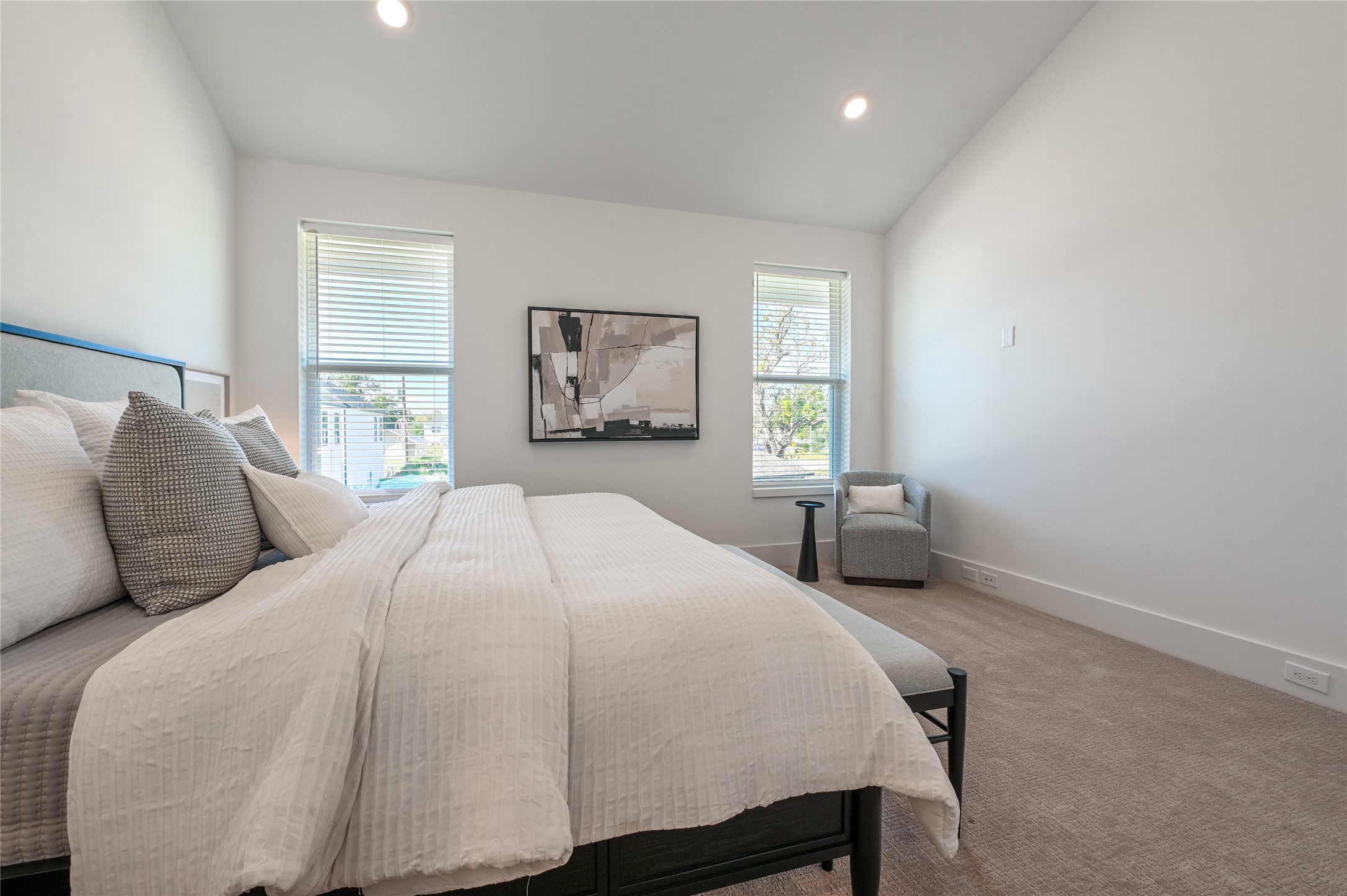 7607 Victory Reserve Street Houston, TX 77088 - Photo 26 of 50 a bedroom with a bed a dresser and window