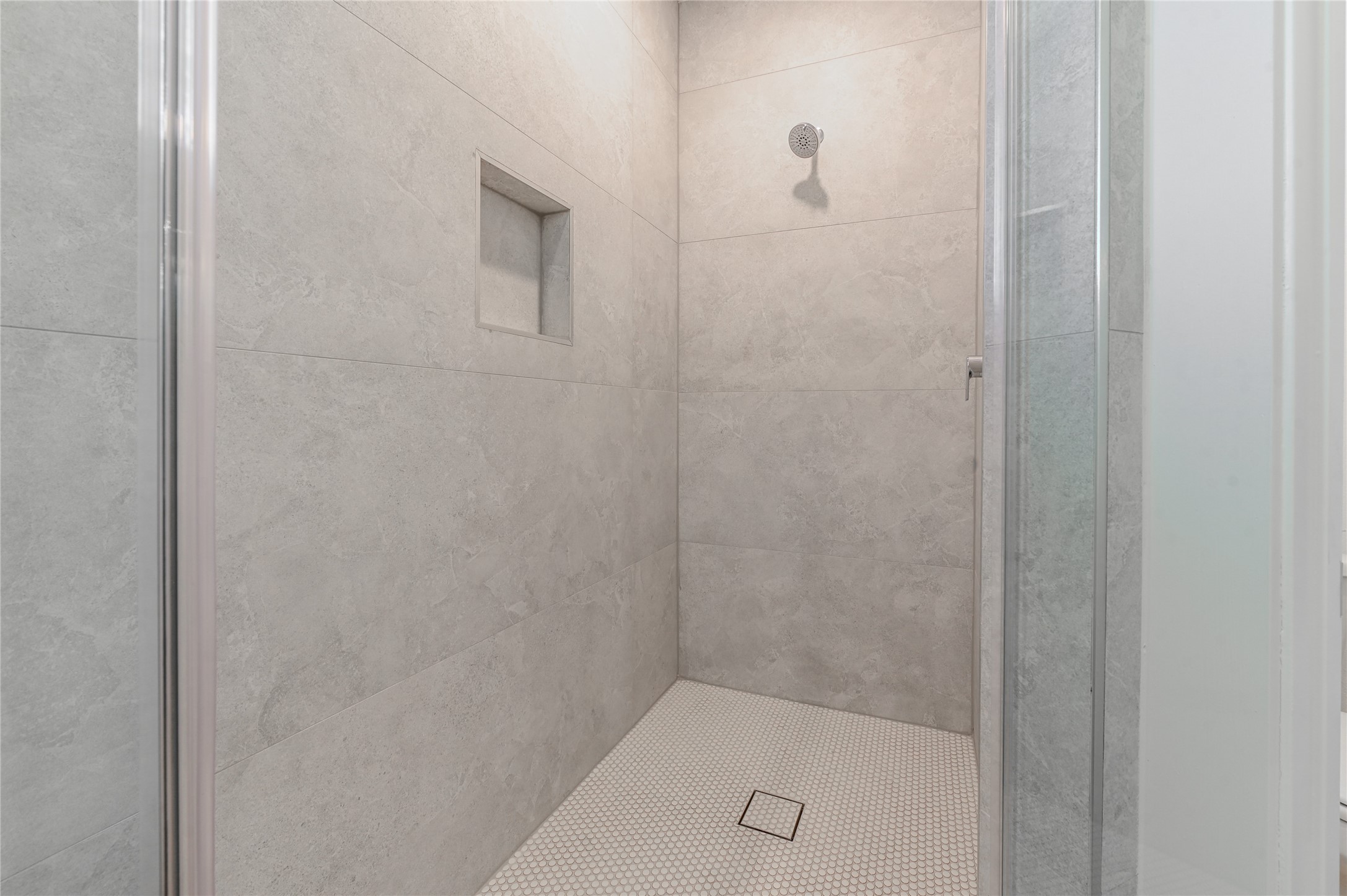 7607 Victory Reserve Street Houston, TX 77088 - Photo 33 of 50 a bathroom with a shower