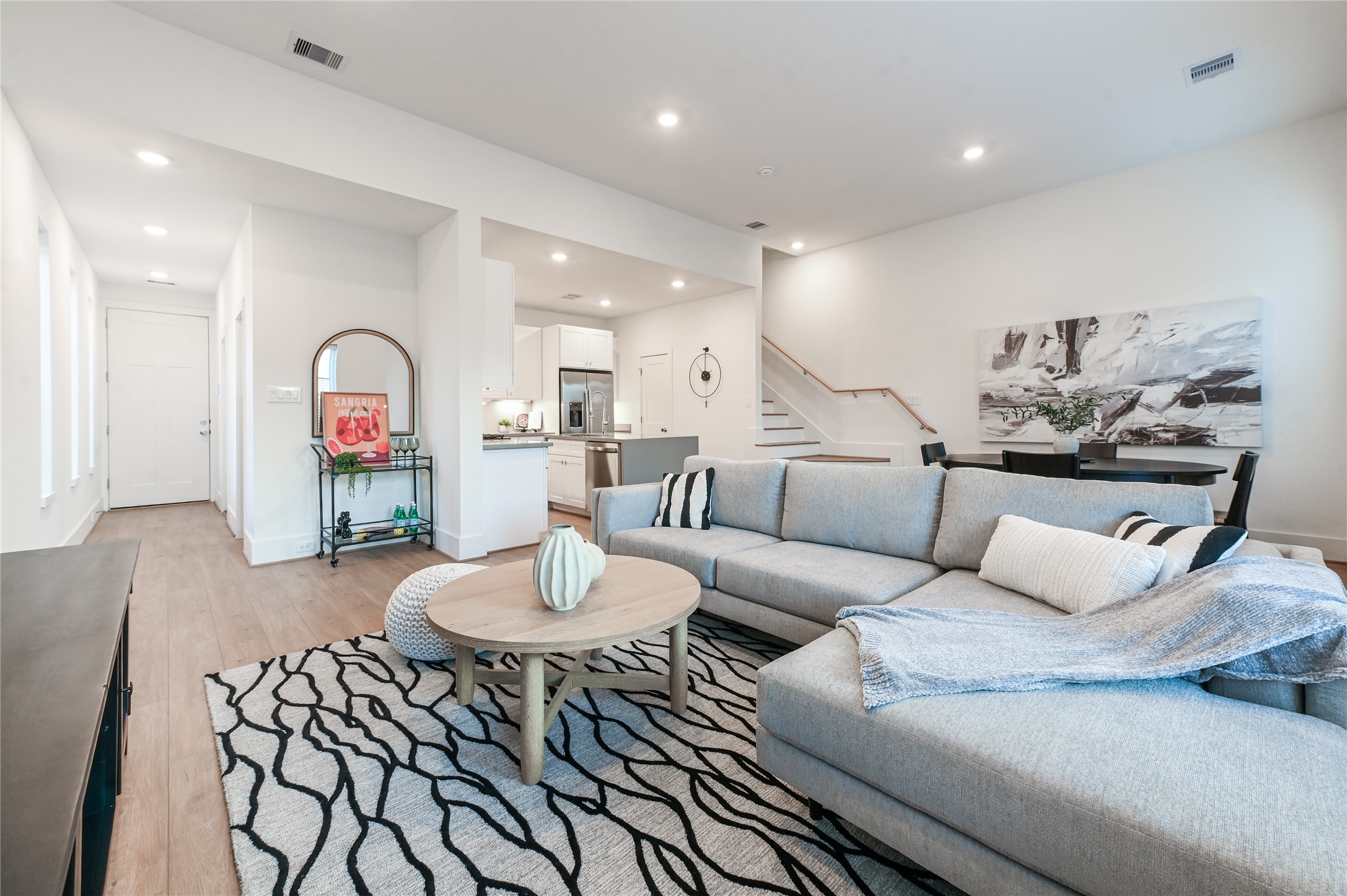 7607 Victory Reserve Street Houston, TX 77088 - Photo 4 of 50 a living room with furniture and a wooden floor