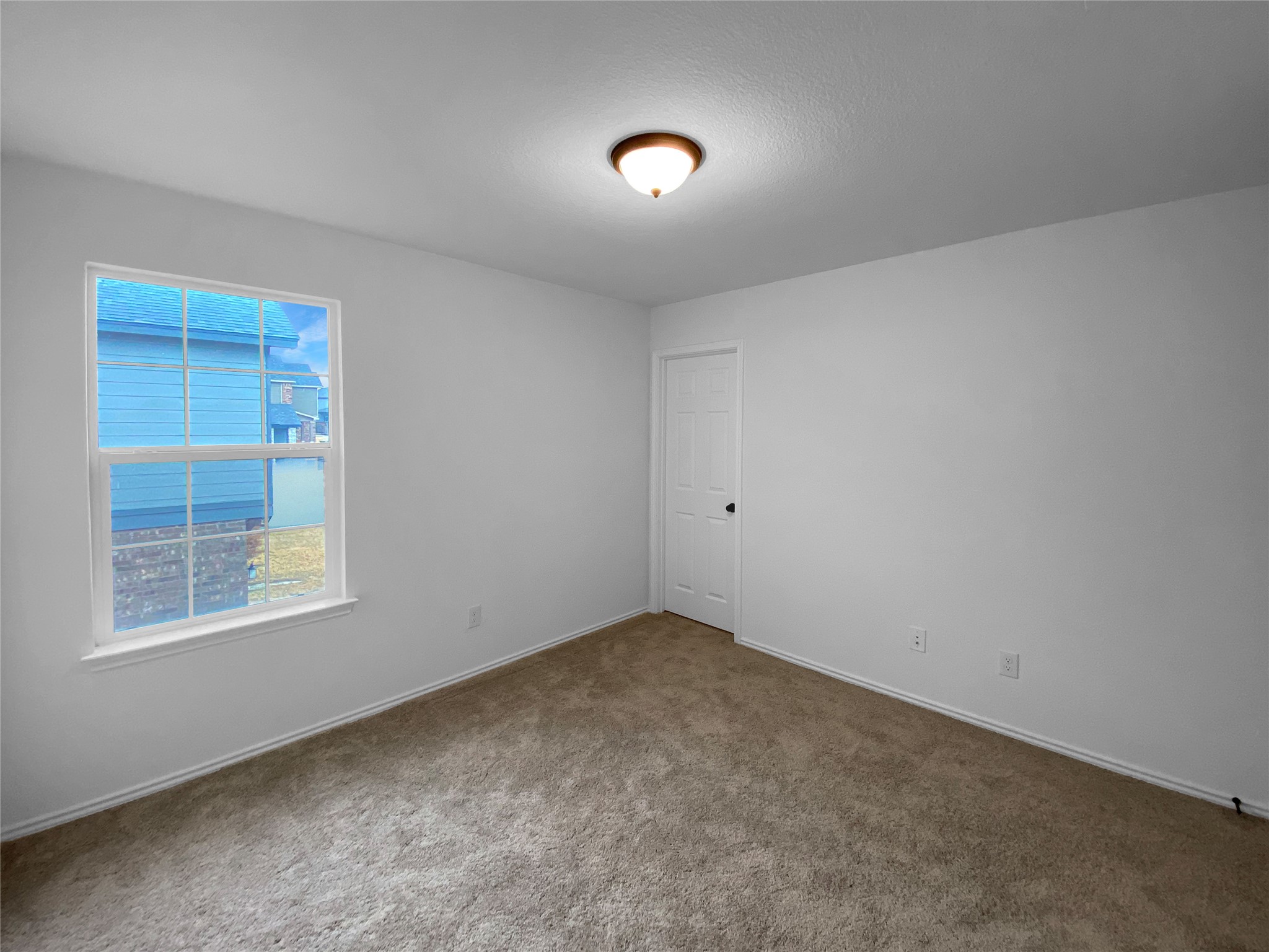 932 Yellow Ribbon Trail Jarrell, TX 76537 - Photo 20 of 26 Carpeted spare room with baseboards