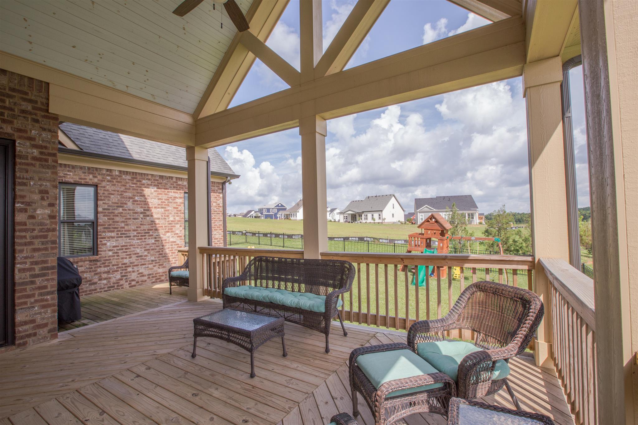 100 Truman Road West Franklin, TN 37064 - Photo 22 of 24 a balcony with furniture and wooden floor