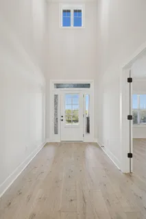 a kitchen with stainless steel appliances a refrigerator sink and stove