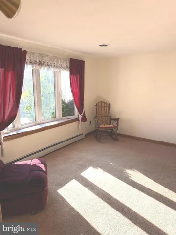 a kitchen with stainless steel appliances a stove a refrigerator and a sink