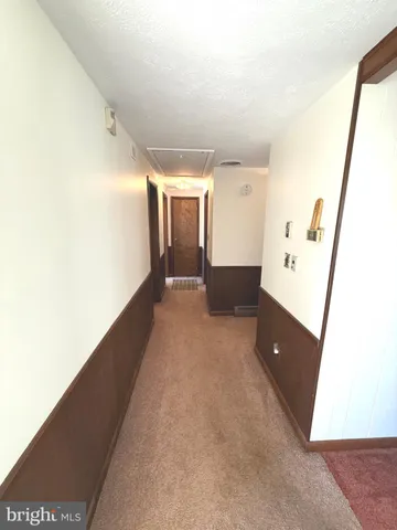 an aerial view of a houses with yard