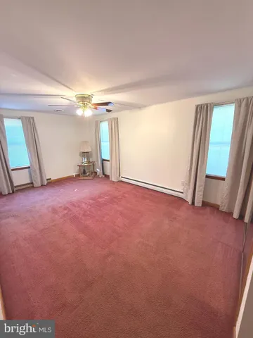 a view of an ocean and a yard