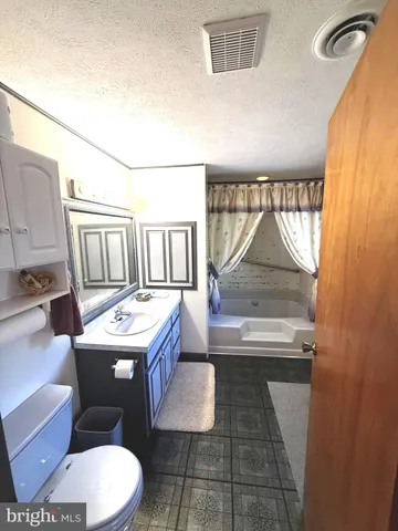 a view of a city with an ocean