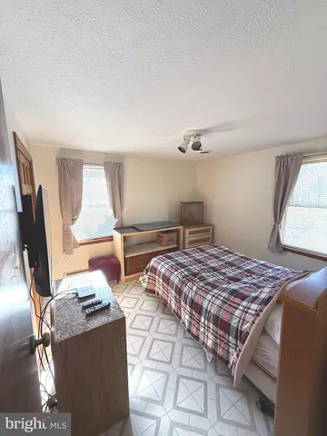 a view of swimming pool with a yard