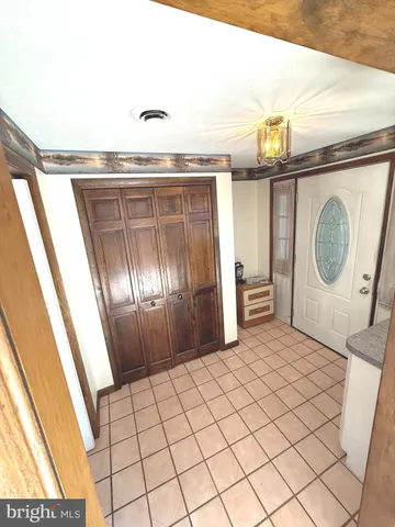 a view of livingroom with furniture and window