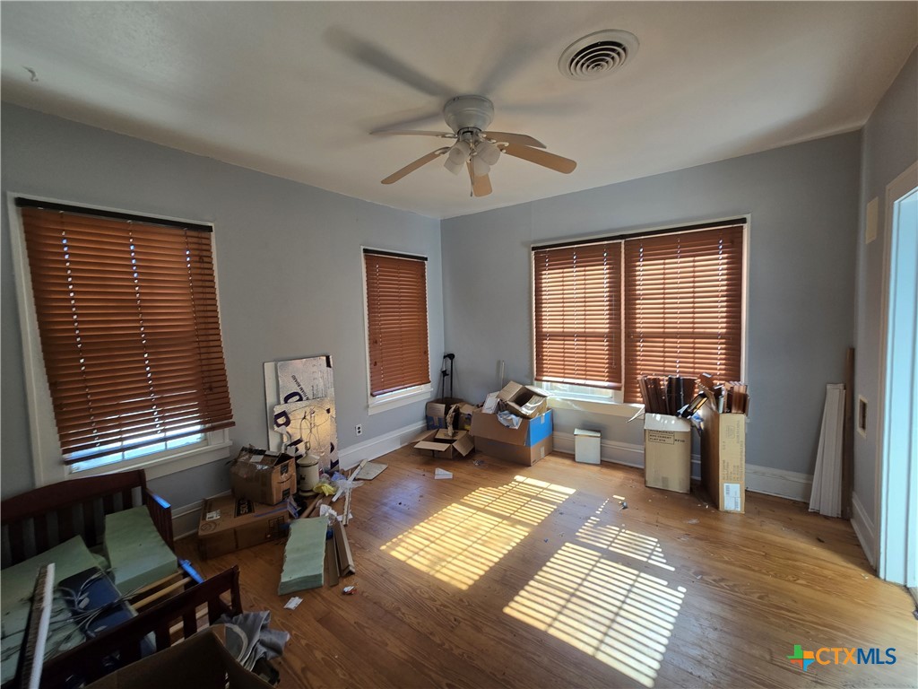 404 Fennimore Street Gatesville, TX 76528 - Photo 10 of 19 a living room with furniture and a window