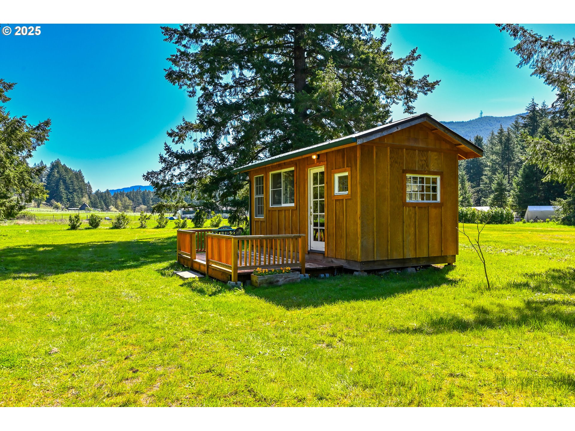 38305 Lower Brice Creek Road Dorena, OR 97434 - Photo 17 of 40 a view of a house with a backyard