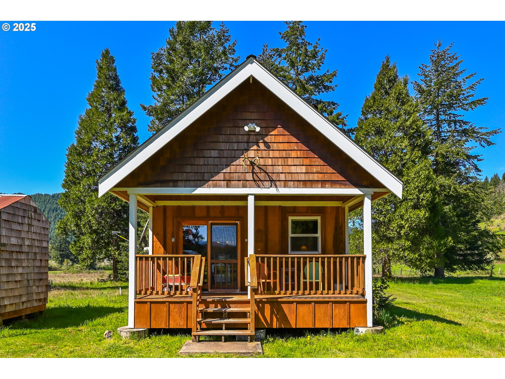 38305 Lower Brice Creek Road Dorena, OR 97434 - Photo 3 of 40 a view of a house with a yard
