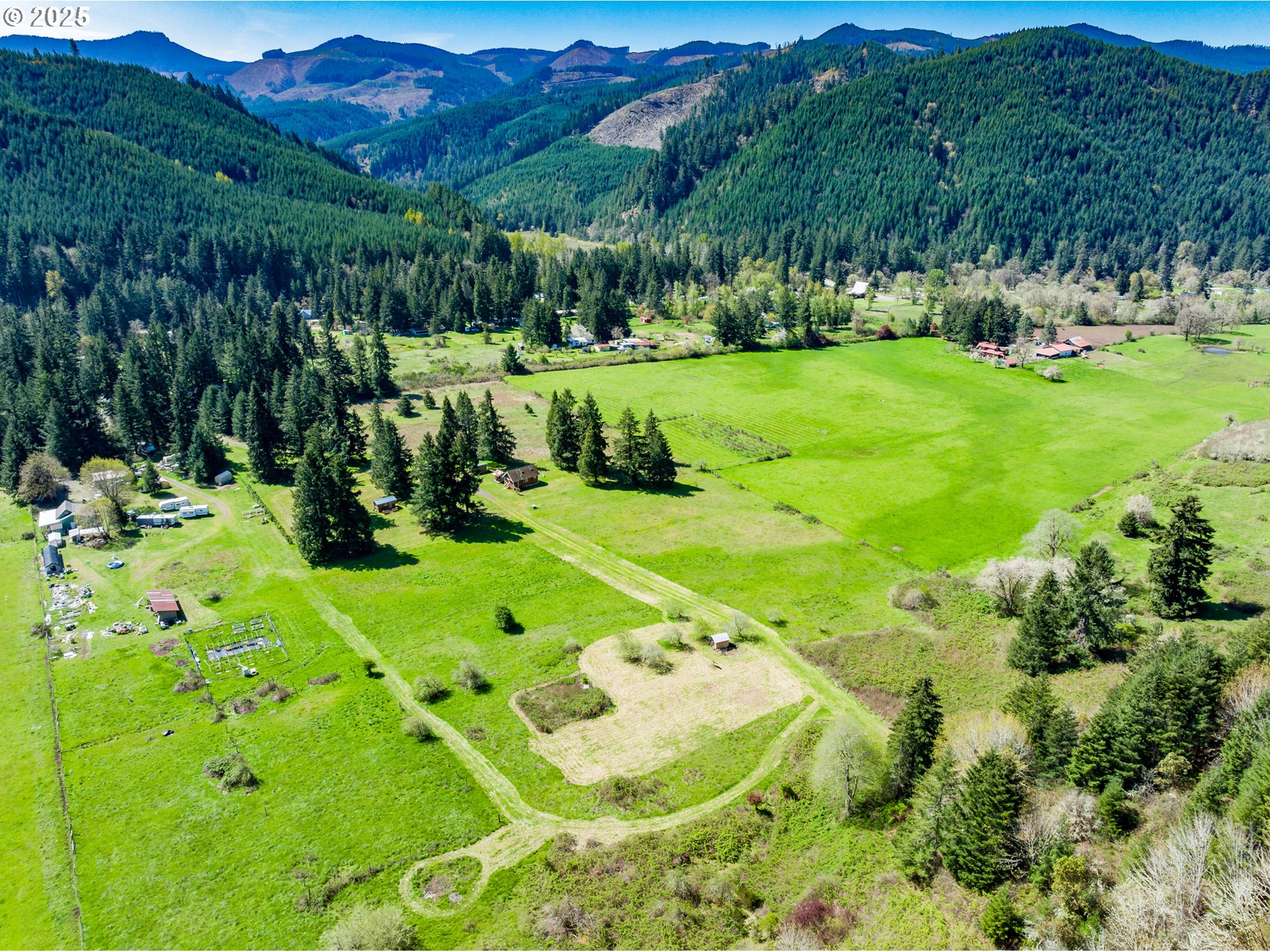 38305 Lower Brice Creek Road Dorena, OR 97434 - Photo 36 of 40 a view of a golf course with a garden