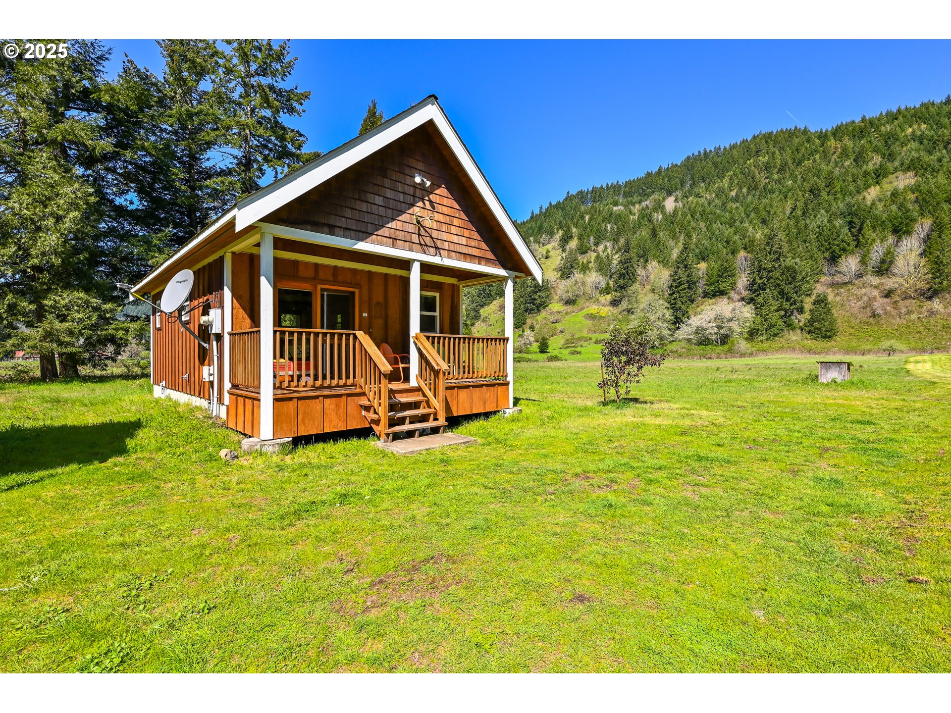 38305 Lower Brice Creek Road Dorena, OR 97434 - Photo 4 of 40 a view of a house with garden