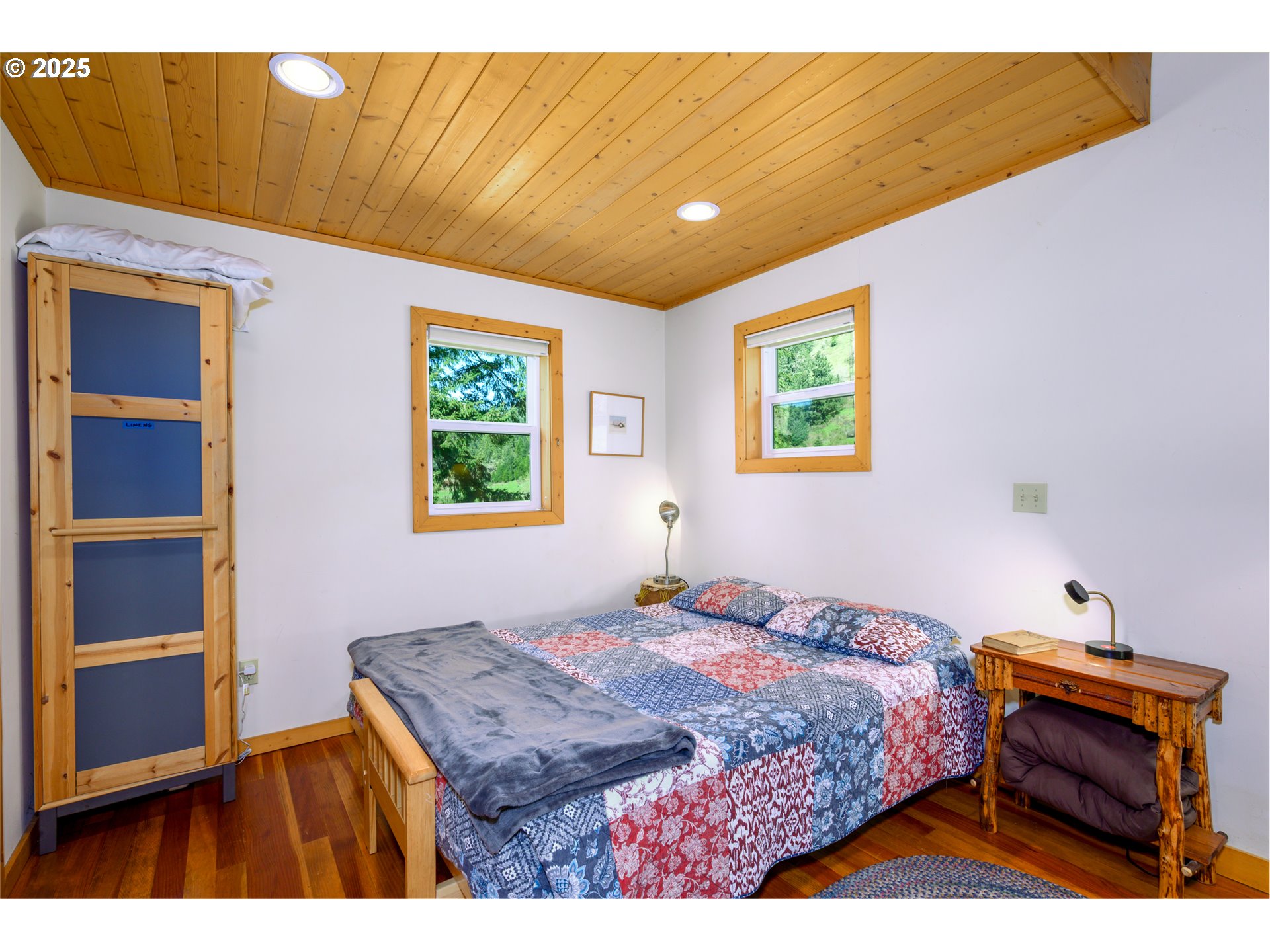 38305 Lower Brice Creek Road Dorena, OR 97434 - Photo 10 of 40 a bedroom with a bed and a window