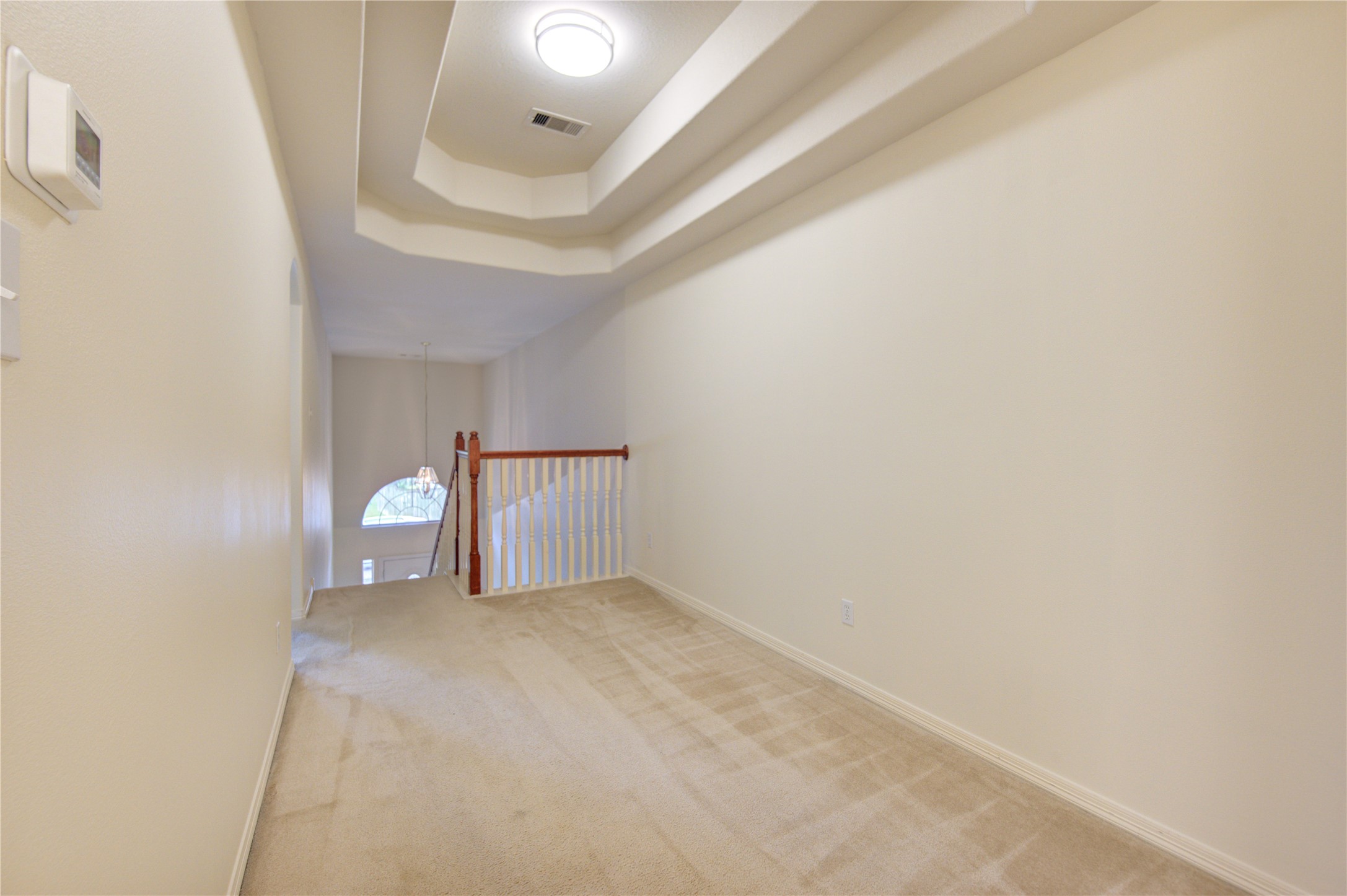 7611 South Linpar Court Houston, TX 77040 - Photo 28 of 48 a view of a big room with wooden floor and windows