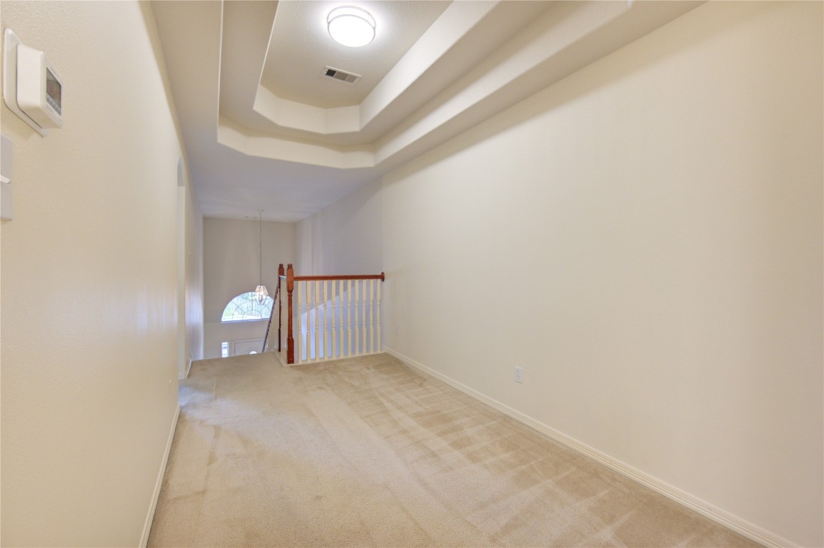 7611 South Linpar Court Houston, TX 77040 - Photo 28 of 49 a view of a big room with wooden floor and windows