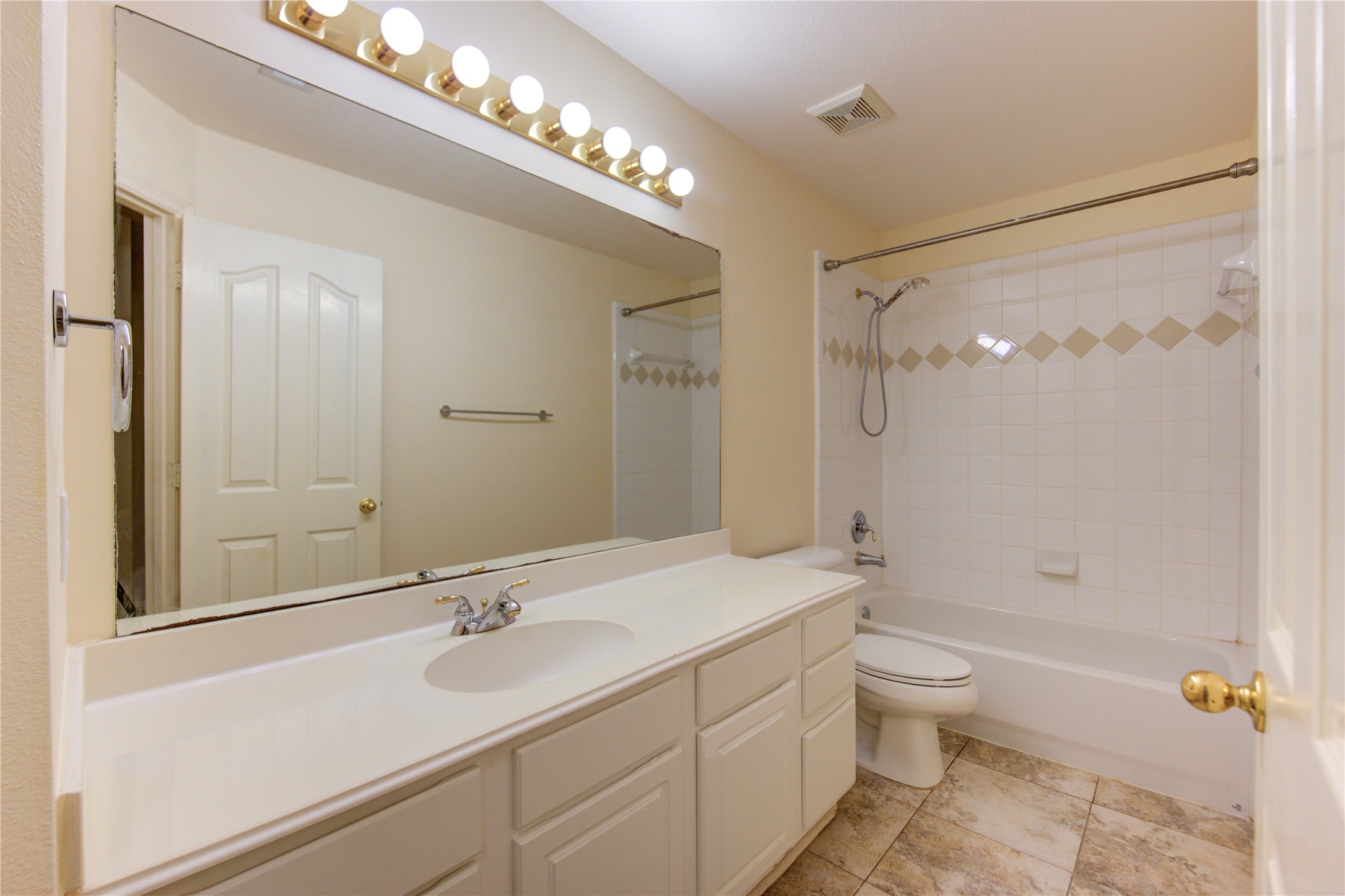7611 South Linpar Court Houston, TX 77040 - Photo 41 of 48 a bathroom with a granite countertop sink a toilet and shower