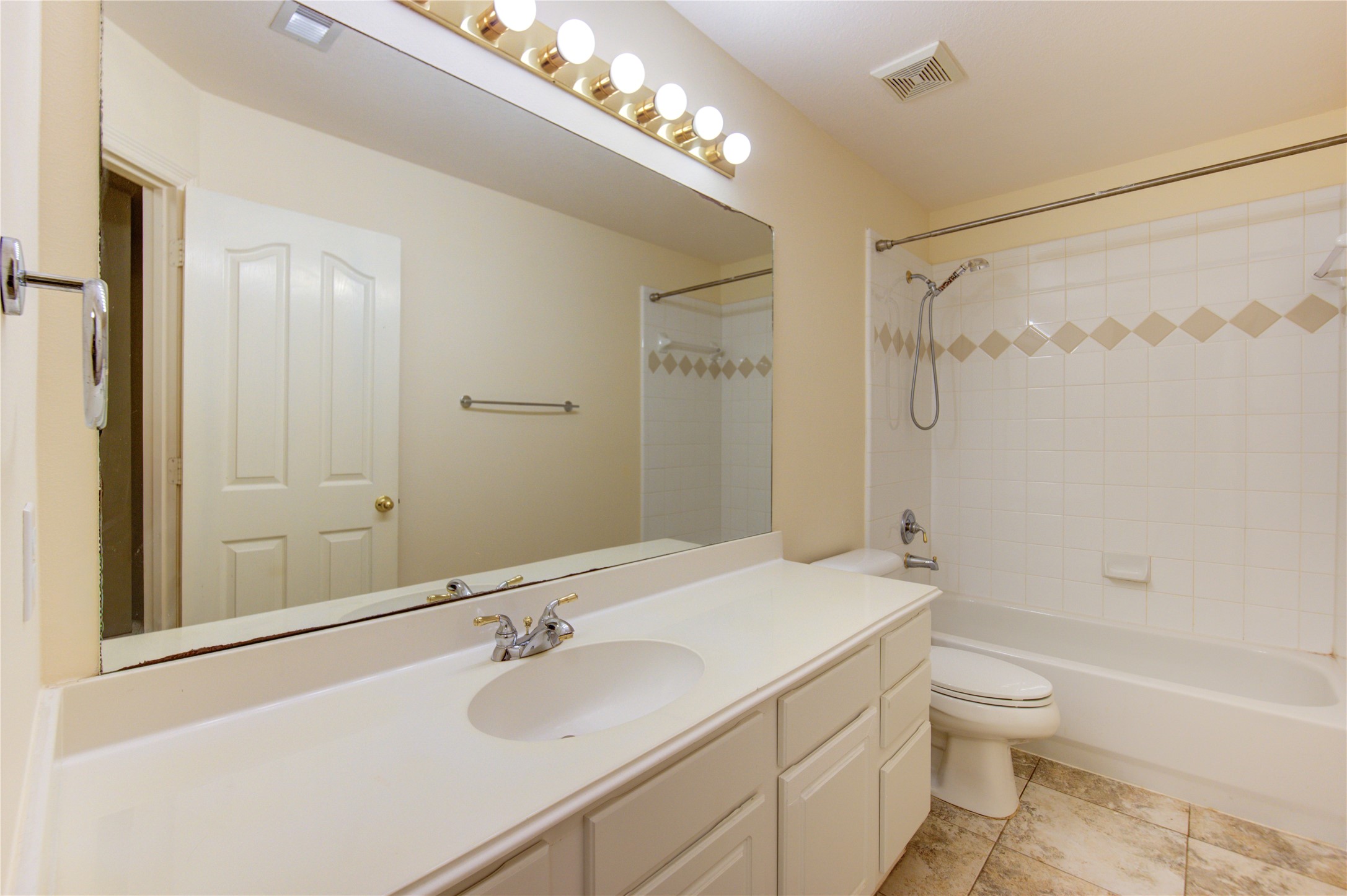 7611 South Linpar Court Houston, TX 77040 - Photo 42 of 48 a bathroom with a sink a toilet and shower