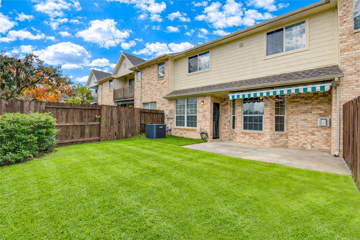 7611 South Linpar Court Houston, TX 77040 - Photo 46 of 49 a view of a house with a yard and sitting area