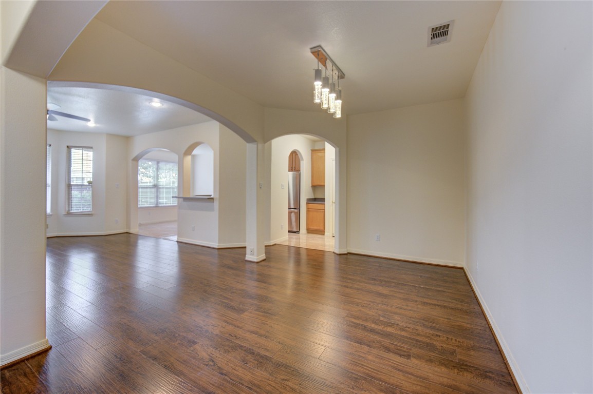 7611 South Linpar Court Houston, TX 77040 - Photo 8 of 49 a view of an entryway with wooden floors