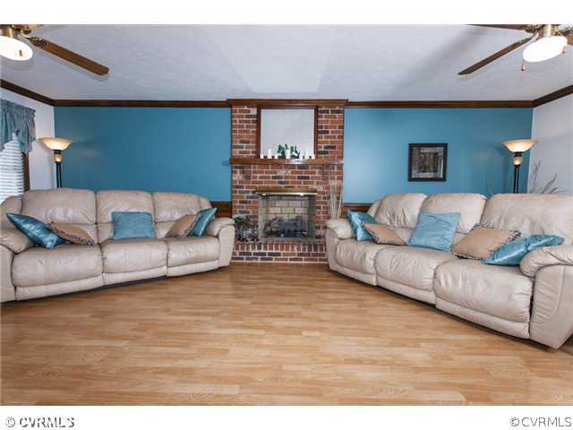 7317 Barkbridge Road Chesterfield, VA 23832 - Photo 3 of 24 a living room with furniture and a flat screen tv